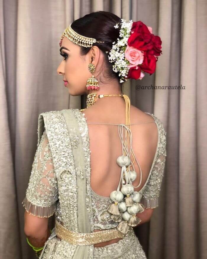 Tassels enhance the beauty of the blouse designs. Bridal lehenga blouses look absolutely stunning with these gorgeous tassels. The detailing of these latkans for blouse will surely inspire you for your Indian bridal lehenga choli. Take a look at these tassel for saree pallu, tassel for lehenga and tassel for the blouse. #lehengacholi #mehndidesigns #blousedesigns #latkanforblouse #latkansforlehenga #bridallehenga #uniquelehenga #tasselforsareepallu #tasselforlehenga #customizedtassels Bridal Blouse Tassels Designs, Saree Blouse Tassels Design, Tassel For Lehenga, Latkan Designs For Blouse, Latkan Lehenga, Lehenga Trendy, Lehenga Tassels, Blouse Designs Bridal, Lehenga Blouses