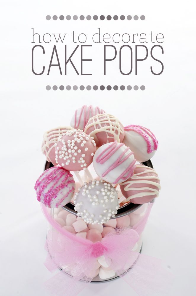 there is a pink and white cake pop in a glass container with the words how to decorate cake pops on it