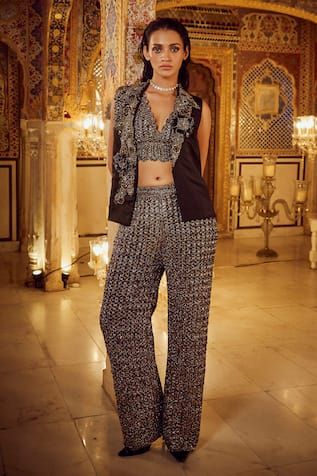 Black blazer featuring abstract motif on the neckline. Paired with a mesh bralette and a mesh pant. - Aza Fashions Embellished Sleeveless Formal Sets, Sleeveless Glamorous Formal Sets, Abstract Motif, Sanya Malhotra, Mesh Pants, Jacqueline Fernandez, Pant Sets, Silk Organza, Black Abstract