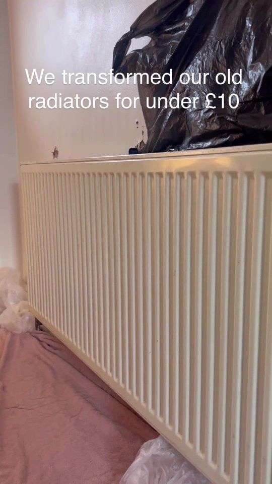 a radiator is being installed in an empty room