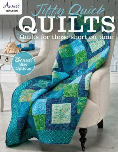 a chair with a quilt on it and the cover of a book titled, fifty quick quilt