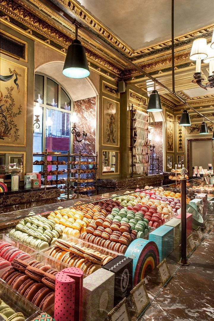 a store filled with lots of different types of donuts