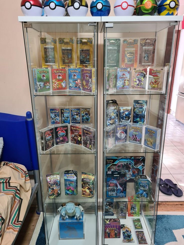 a display case filled with lots of different types of pokemon toys on top of each other