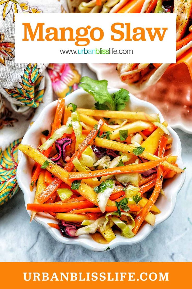 mango slaw in a white bowl on a marble counter top with text overlay