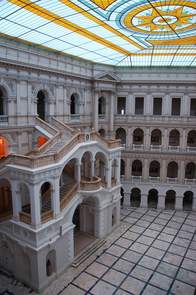 the inside of a large building with many windows