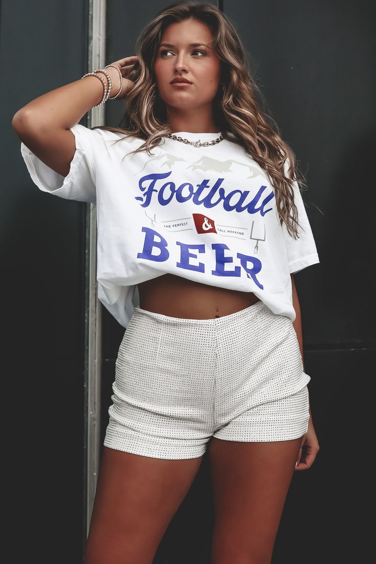 That is what football is all about right? The tailgates!! This tee by CHARLIE SOUTHERN is for our tailgating football loving besties! White graphic football and beer tee, back is blank Material is Cotton Hang to dry Model Maddie is 5'7 wearing a large for an oversized look SHOP THE LOOK Small Medium Large X Large Length Bust Sporty Letter Print Tops For Tailgating, Sporty Short Sleeve Tops For Tailgating, School Spirit Tops For Football Season Tailgating, School Spirit Tops For Tailgating During Football Season, Team Spirit Tops For Sports Season Tailgating, Sporty Crew Neck Top For Tailgating, Team Spirit Tops For Tailgating During Sports Season, White Casual Top For Tailgating, Casual White Top For Tailgating