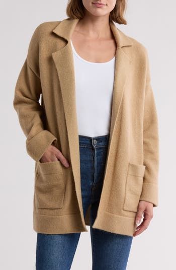 Beige Winter Cardigan For Work, Solid Color Lapel Collar Sweater Coat For Fall, Long Sleeve Soft Knit Sweater Coat For Workwear, Knit Sweater Coat With Pockets For Cold Weather, Beige Soft Knit Outerwear For Fall, Cozy Knit Long Coat, Collared Sweater For Winter Layering, Collared Sweater Coat For Work In Winter, Winter Workwear Sweater Coat With Shawl Collar