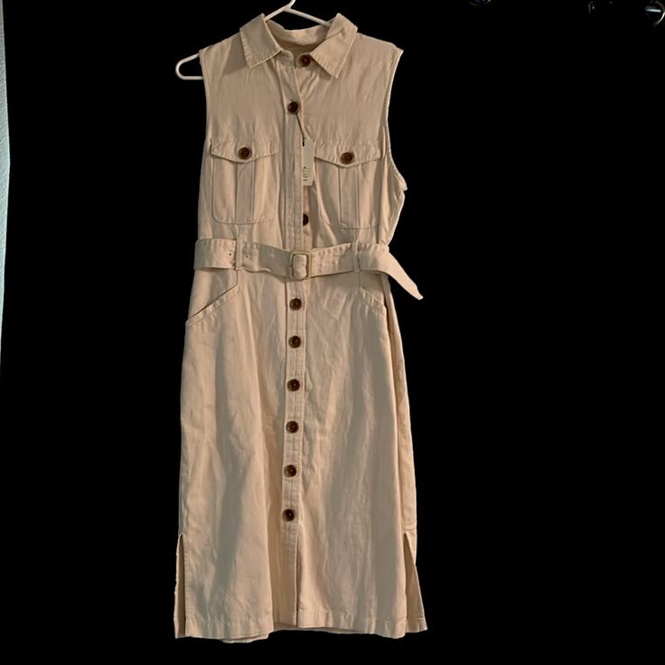 Size 12 Banana Republic Cream Button Down Dress With Pockets Sleeveless Beige Midi Dress With Button Closure, Beige Sleeveless Midi Dress With Button Closure, Cream Sleeveless Dress With Button Closure, Beige Belted Cotton Dress, Beige Sleeveless Midi Dress With Buttons, Beige Button-up Cotton Dress, Beige Button-up Dress With Pockets, Sleeveless Beige Belted Midi Dress, Beige Cotton Dress With Buttons