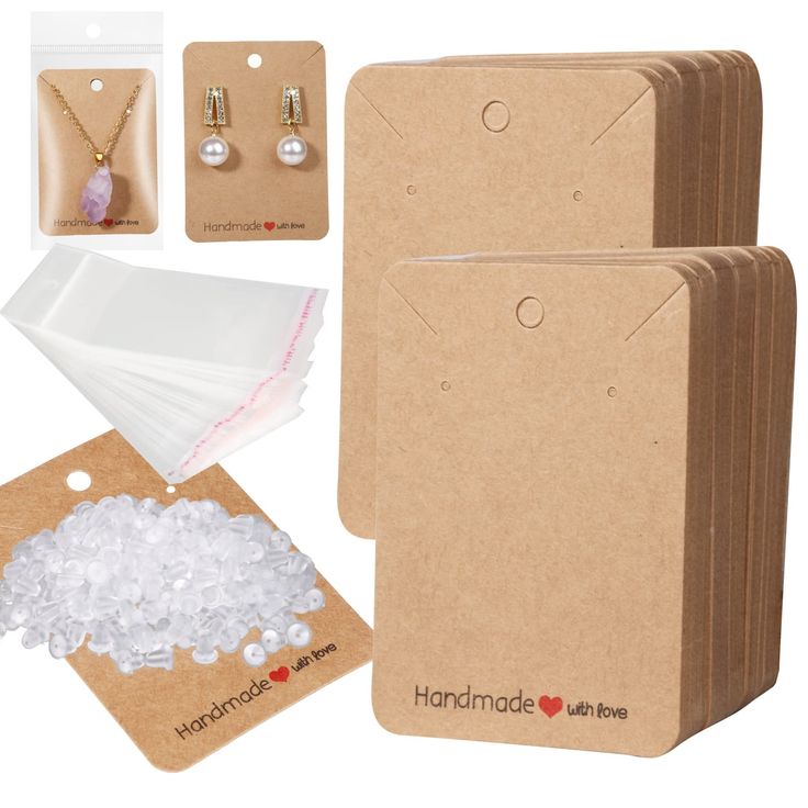 the package includes two earrings, a card and some other items to make it look like they are made out of cardboard