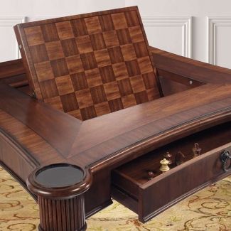 a wooden table with chess pieces in it and an open drawer on the bottom shelf