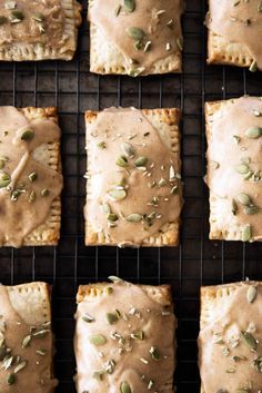 several square pieces of food on a cooling rack