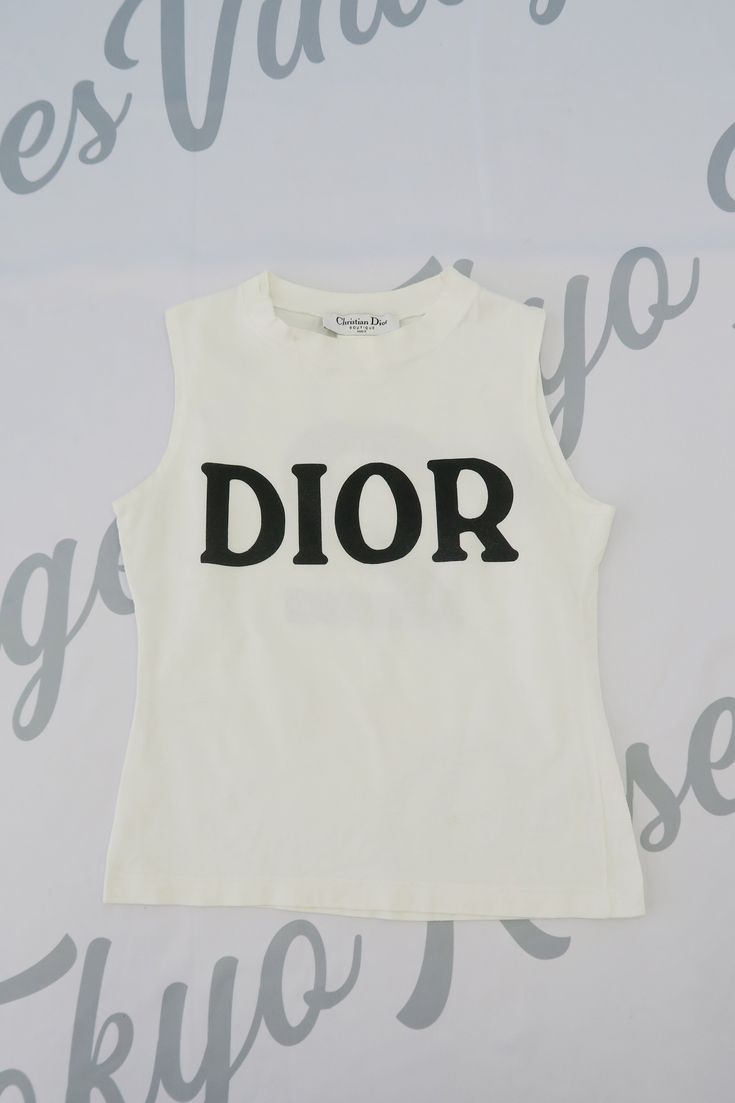 Christian Dior Logo White Sleeveless Tank Top White Summer Vest With Letter Print, Summer White Vest With Letter Print, White Sleeveless Tank Top With Letter Print, Classic White Sleeveless Tank Top, White Classic Crew Neck Tank Top, White Sleeveless Top With Logo Print, White Cotton Tank Top With Logo Print, Vintage White Sleeveless Top, Christian Dior Logo