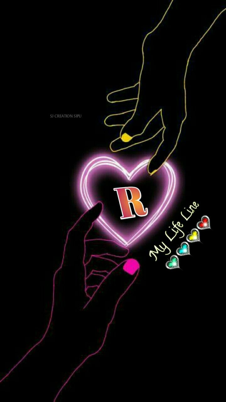 two hands holding a neon heart with the letter r on it and an arrow pointing at it