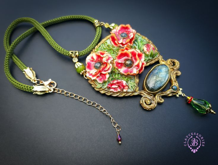 Poppies necklace in Art Nouveau style, all details are sculpted and cut out of high-quality coloured polymer clay, the colours do not fade or fade in the sun, decorated by Labradorite cabochons. Single copy,100% Handmade OOAK necklace. matching earrings: https://www.etsy.com/uk/listing/1280725893/poppy-earrings-in-art-nouveau-style?click_key=b6d4b23e2d50d5aa7c4a7bc978b187efa776339b%3A1280725893&click_sum=7fec5f11&ref=shop_home_active_1&frs=1&sts=1 All items are shipped from my home within 1-3 business days after payment confirmation. Please, contact me with any questions. I make some custom orders. If you would like some items to be custom made or created for you in a special way, feel free to send an Etsy conversation with your requirements, and we can discuss them. Handmade Artisan Polymer Clay Necklaces, Handmade Polymer Clay Pendant Necklace, Unique Hand Painted Polymer Clay Necklaces, Artisan Hand Painted Polymer Clay Necklaces, Handmade Artisan Polymer Clay Necklace, Unique Hand Painted Polymer Clay Necklace, Formal Art Nouveau Necklace, Hand Painted Resin Pendant Necklaces, Hand Painted Resin Pendant Necklace