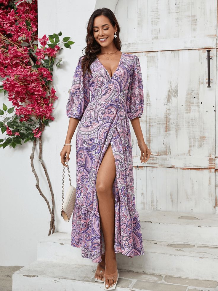 This paisley maxi dress will make you the star of any western wonder! The vibrant print and flowy silhouette will have you feeling free and fearless, while the low V-neckline and quarter sleeves add a touch of elegance. Perfect for a day out in the sun or a night out under the stars. Size Guide: Model is 5’8” tall, and has a 33.4” bust, 26.4” waist, & 35.4” hips. She is wearing a S / US 4 / AU 8. This dress is true to size. Material: 100% Polyester Feature: V-Neckline. Ruffle Bell Sleeves. Swirl Paisley Print. Side Slit. Waist Tie Detail. Wrap dress. Maxi length. Not lined. Relaxed fit. Care Instructions: Machine wash / Cold hand wash Tied Dress, Home Dress Women, Holiday Dresses Women, Holiday Skirts, Paisley Maxi Dress, Casual Party Dresses, Split Maxi Dress, Split Dress, Slim Fit Dresses