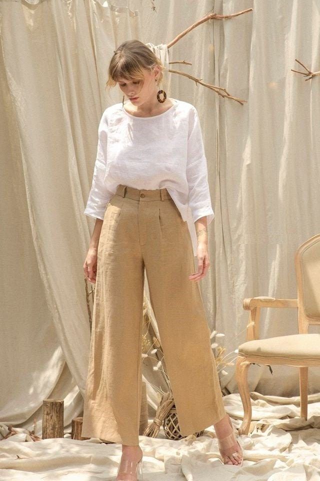 Linen Palazzo Pants - Wide Legs Linen Pants in Ivory This pants design has Back Elastic Waist to make it more comfortable to wear. This item is HANDMADE and MADE TO ORDER Material: Linen, Cotton Weight: Medium --------------------------------------- * All garments have been pre-washed to avoid shrinkage * We accept Custom Order Request. If you want to make your own designs or customize or change details of our designs or make the garment(s) based on your own measurements,... please let us know. Linen Pant And Top Set, Styling Wide Leg Linen Pants, Loose Linen Pants Outfit, Blouse With Wide Leg Pants, Wide Leg Linen Pants Outfit, Linen Set Women, Linen Pants Set, Linen Set Outfit, Palazzo Pants Summer