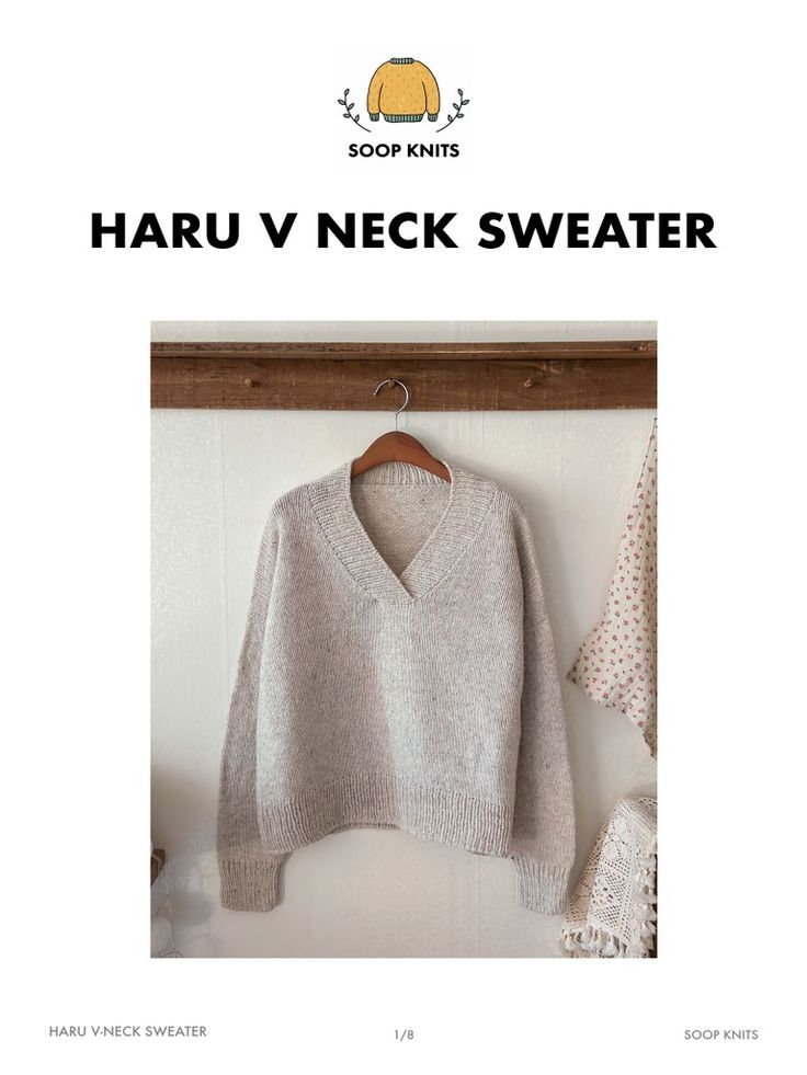 an image of a sweater hanging on a clothes rack with the words haru v neck sweater