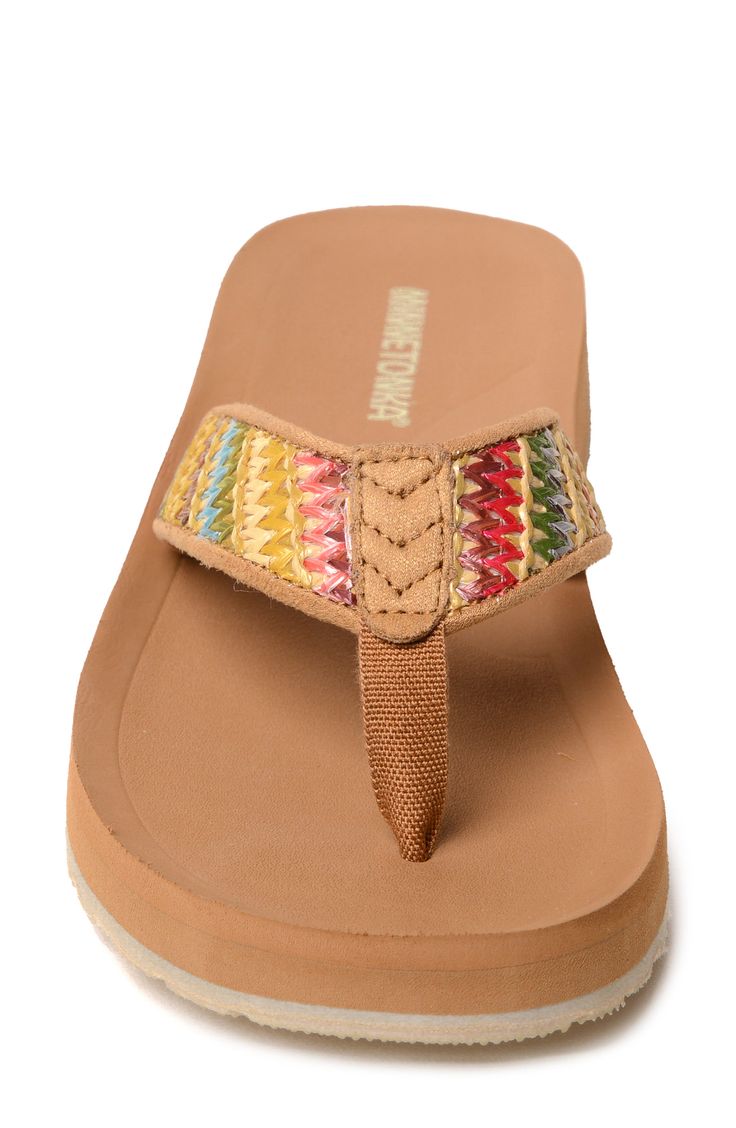 A cushioned footbed and thick rubber sole lend comfortable support to a stylish flip-flop secured with a center toe post. Cushioned footbed Textile upper and lining/rubber sole Imported Beach Slippers With Removable Insole And Toe Post, Adjustable Textile Sandals For Vacation, Adjustable Textile Beach Sandals, Toe Post Slippers With Removable Insole For Beach, Beach T-strap Flip Flops With Cushioned Footbed, Cushioned T-strap Flip Flops For Vacation, Beach Flip Flops With Cushioned Footbed And T-strap, Cushioned T-strap Flip Flops For Beach, Comfortable T-strap Flip Flops For Beach