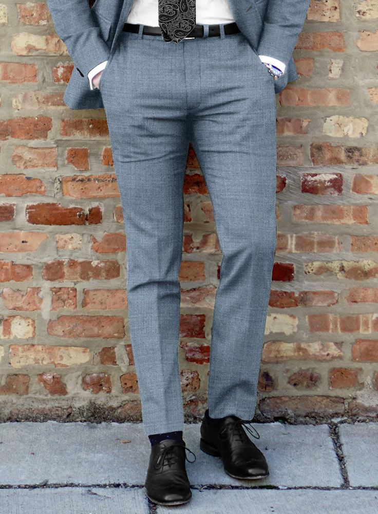 As sure as the sky is blue and these pants are blue, it's highly likely that our Lanificio Zegna Trofeo Jordy Blue Wool Pants have something to offer you. Crafted from superfine Australian wool fabric, these pants are characterized by a jordy blue tone with a solid texture, making them perfect for gentlemen who appreciate a neatly tailored look but also believe that there's more to life than cubicles, dull meetings, and the daily corporate grind.  Look Includes    Lanificio     Zegna     Trofeo Blue Straight Dress Pants With Pressed Crease, Blue Business Pants With Straight Hem, Business Blue Pants With Straight Hem, Blue Tapered Leg Dress Pants With Pressed Crease, Blue Pressed Crease Bottoms For Business Casual, Blue Tailored Tapered Leg Pants, Blue Suits With Welt Pockets And Tapered Legs, Tailored Blue Tapered Leg Pants, Fitted Classic Light Blue Bottoms