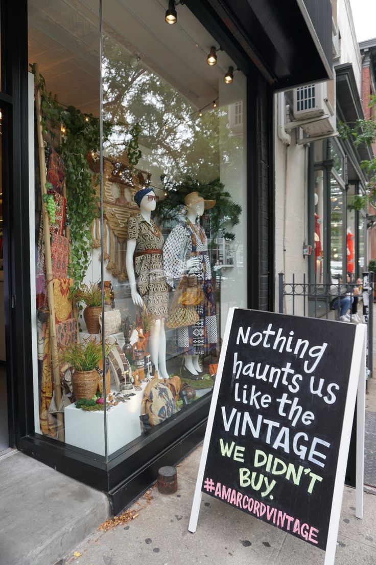 there is a sign in front of the store that says nothing hurts us like the vintage we didn't buy