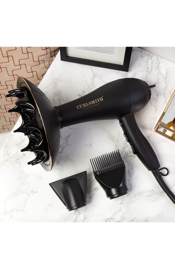 What it is: A hair dryer with a revolutionary diffuser designed specifically with the needs of wavy, curly and coily hair types in mind.Who it's for: Ideal for all hair types.What it does: This hair dryer and diffuser uses the latest and greatest technology to make drying your hair as easy as possible. The diffuser is huge, so it covers more hair at the same time. It features an even airflow that helps keep frizz to a minimum. The dryer provides even, gentle heat to minimize damage. It even has Hair Dryer And Diffuser, Hair Dryer With Diffuser, Diffuser Blow Dryer Curly Hair, Defusers For Hair, Diffuser For Hair, Best Diffuser For Curly Hair, Defusers For Curly Hair, Hair Diffuser Curly, Curly Hair Dryer