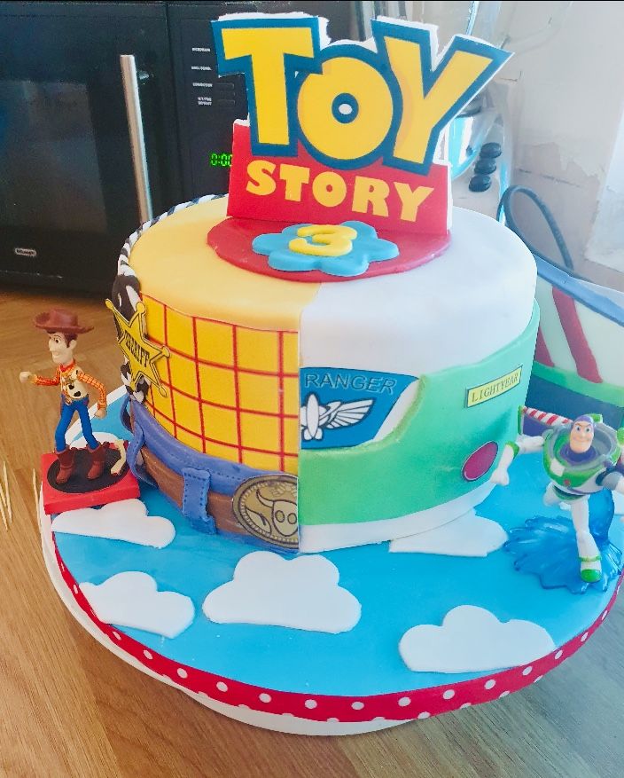 a toy story themed cake on a table