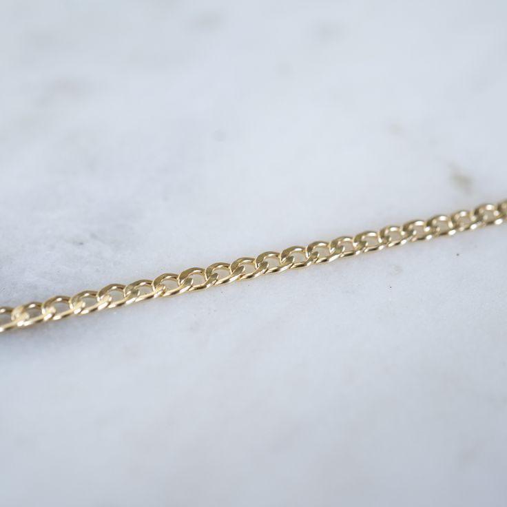 "14k Gold filled Curb Link Bracelet Our new 14k Gold filled Chain and Link Bracelets are a classic addition to your ring collection. If you would like a smaller size than a 6.5\", Please make a comment in the notes section at checkout. Wear one on its own for a simple look or stack with our other gold bracelets! Material: 14k Gold Filled or .925 Sterling Silver" Minimalist 14k Gold Curb Chain Bracelet, Yellow Gold Link Bracelet As Gift, 14k Gold Curb Chain Link Bracelet, Dainty Curb Chain Bracelets For Formal Occasions, Dainty Curb Chain Bracelet For Formal Occasions, Dainty Curb Chain Bracelet For Formal Events, Dainty Yellow Gold Curb Chain Bracelet, Classic Gold Bracelets With Rolo Chain, Dainty Yellow Gold Chain Bracelet With Curb Chain