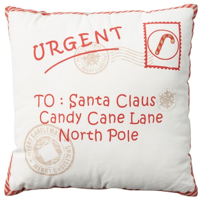 a white pillow with an orange border and red lettering on it that says, to santa claus candy cane lane north pole