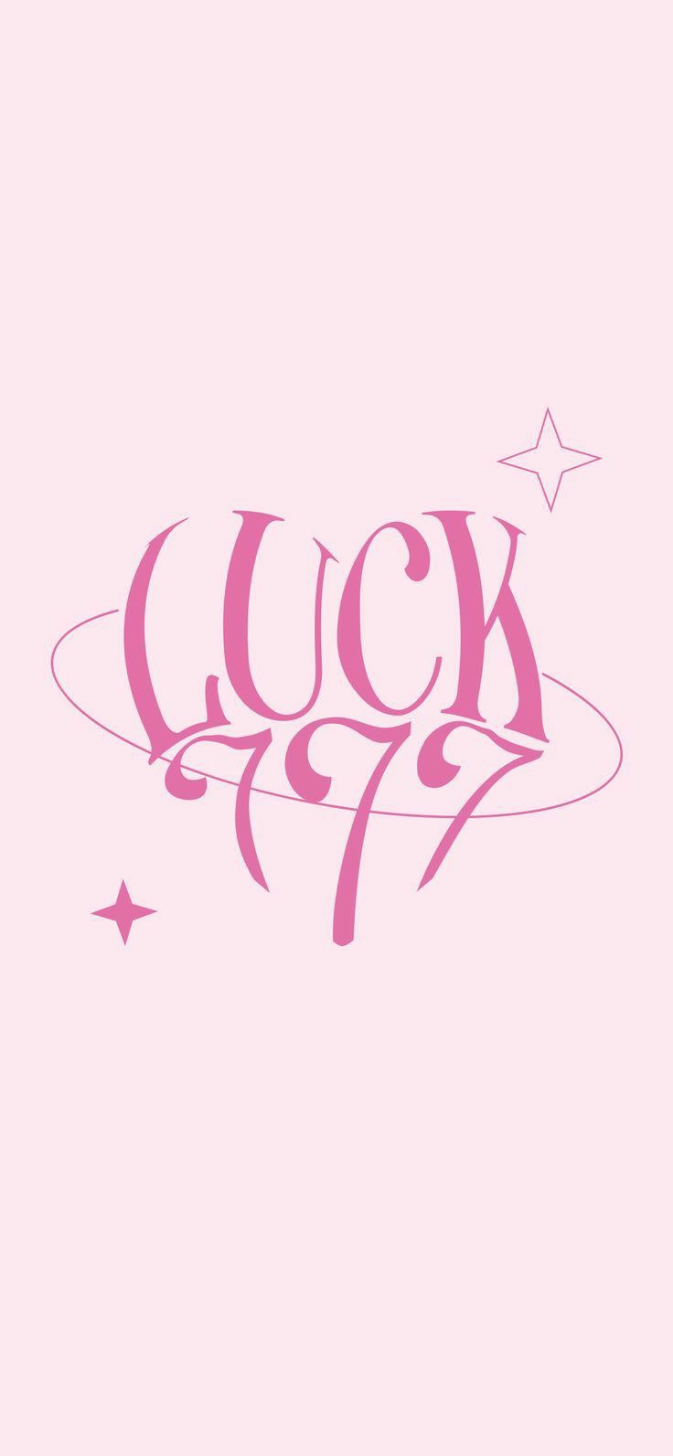 a pink background with the word luck written in cursive writing and stars on it