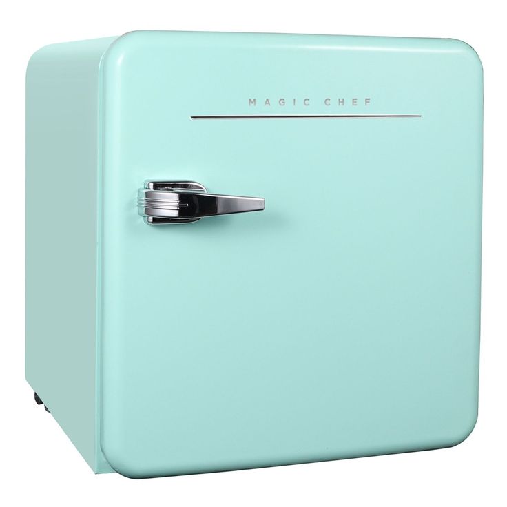 a mint green refrigerator freezer sitting on top of a white floor