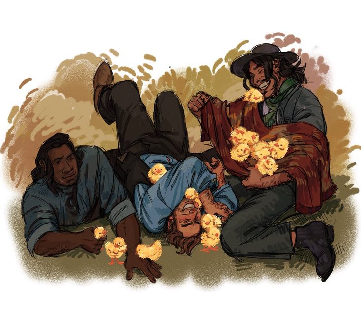 three people laying on the ground with flowers in their hands