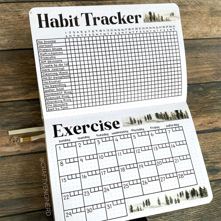 an exercise book with the words habit tracker on it