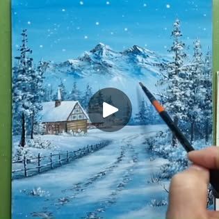 someone is painting a snowy scene with a brush