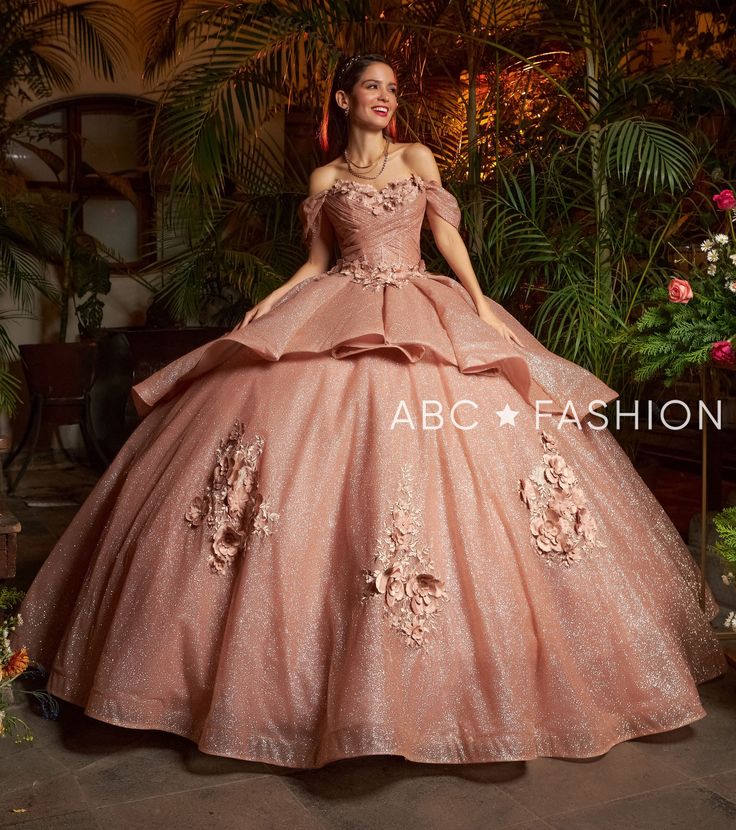 Receive lots of compliments in this 3D floral applique off the shoulder glitter ball gown with A-line skirt by Ragazza Fashion EV15-615. This beautiful long off the shoulder dress features a sweetheart bodice adorned with beaded 3D floral appliques, open lace-up corset back, and a floor length A-line skirt with a sweep train. 3D Floral Applique Glitter Off Shoulder Quinceanera Dress by Ragazza EV15-615 Designer: Blossom Collection by Ragazza Fashion 2023 Style Number: EV20-620 Colors: Emerald Gr Ragazza Quinceanera Dresses, Quinceanera Ball Gown With Floral Applique For Prom Season, Luxury Quinceanera Dress With Floral Applique, Red Quinceanera Dresses With 3d Flowers, Long Off The Shoulder Dress, Gold Quinceanera Dresses Quincedresses.com, Glitter Ball Gown, Red Charro Quinceanera Dress Quincedresses.com, Quinceanera Dresses Red