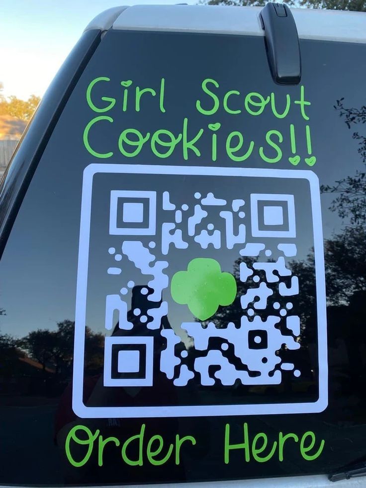 a sticker on the back of a car that says, girl scout cookies order here