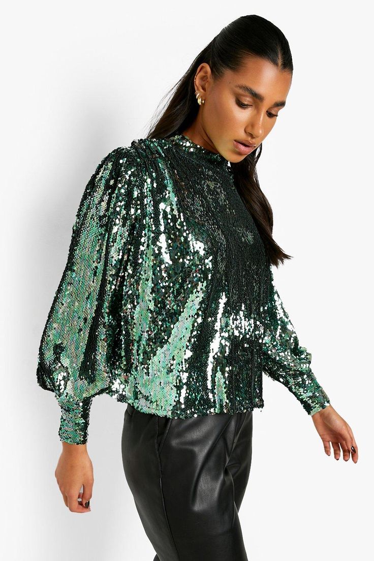 Womens Sequin Volume High Neck Top - Green - 6 - Wanna stand out from the crowd? Featuring bold, small, disco-shaped discs which reflect the light for a real head-turning look, prepare to upstage the glitterball this season in this sequin top from our latest collection. Sparkly, bold, and perfect for party season, this glamorous style is everything we've been scrolling for. Dress it up with a mini skirt and statement heels, or pair this sparkly top with your fave jeans and a leather jacket for a Fashionable Tops, Sparkly Top, Christmas Tops, High Neck Top, Glamorous Style, Green Sequins, Shirts Design, New Energy, Effortless Elegance