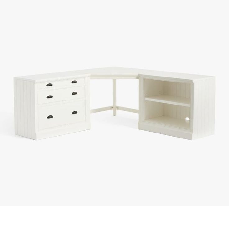 a white corner desk with drawers and shelves