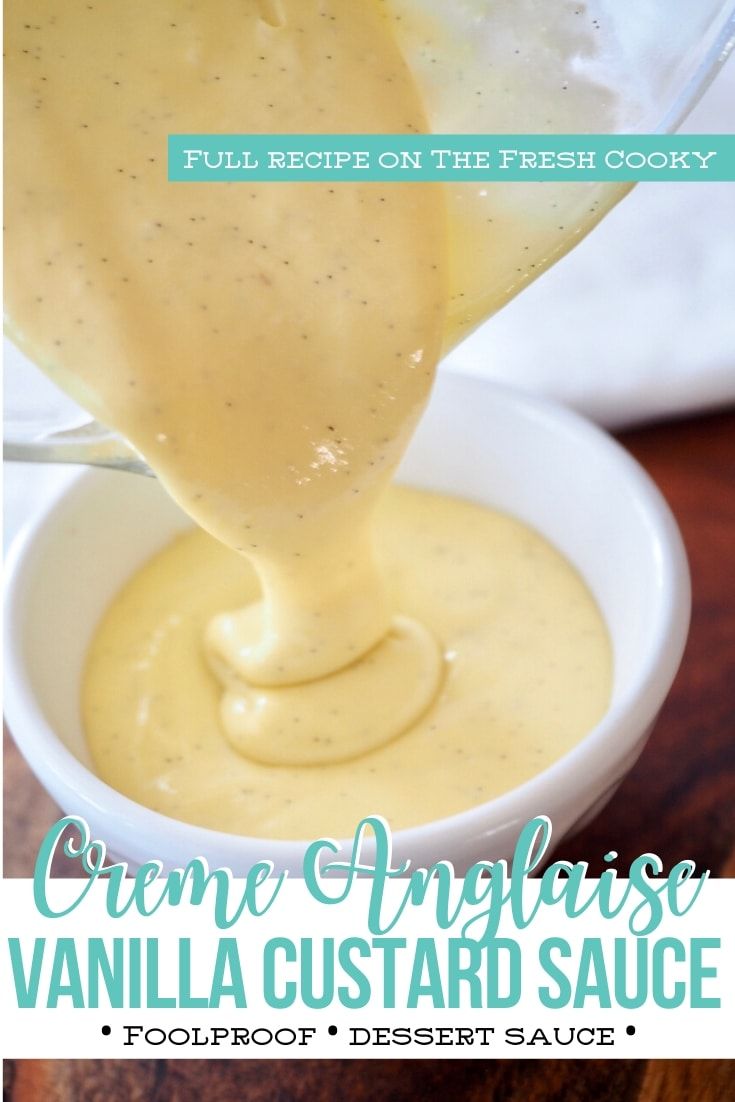 a spoon pouring sauce into a white bowl on top of a wooden table with the words creme angaise vanilla custard sauce