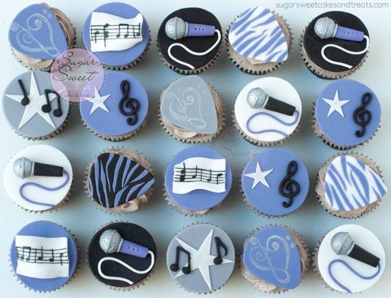 cupcakes decorated with musical instruments and stars