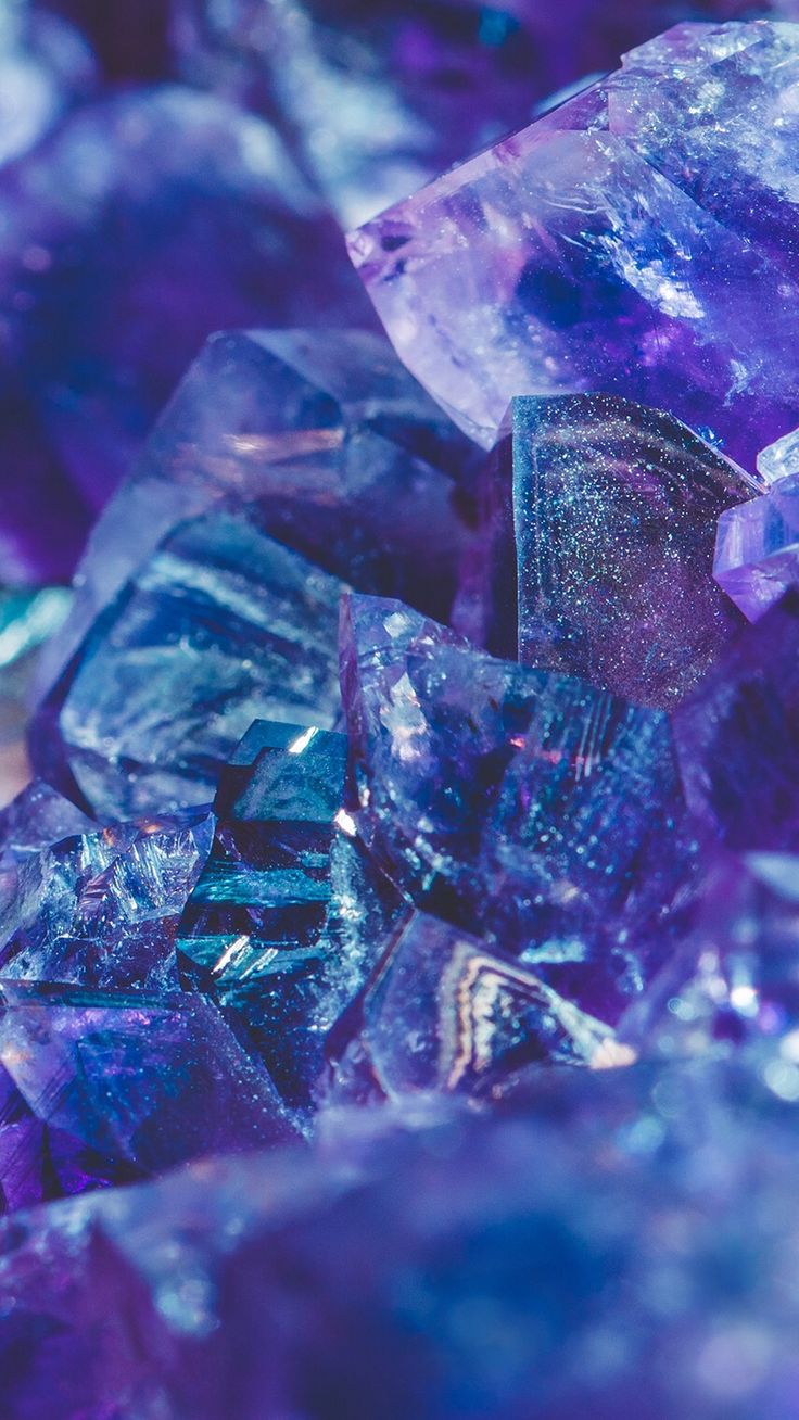 some very pretty purple and blue crystals in the middle of it's own pile