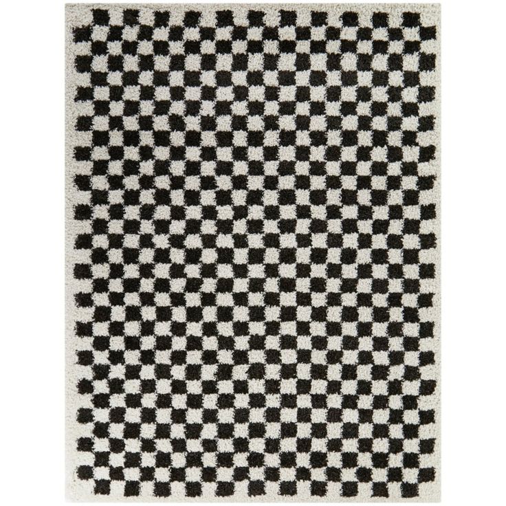 a black and white rug with checkered squares on the bottom, it is shown