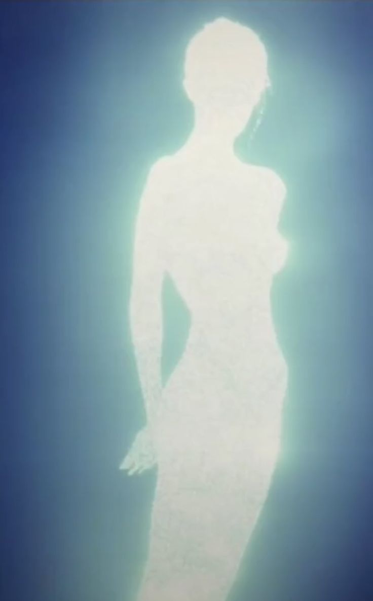 the silhouette of a woman is shown against a blue background