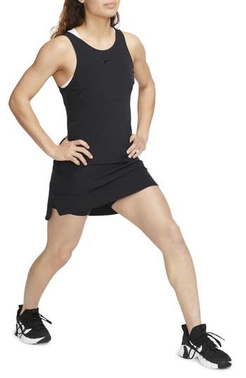 Stretchy, moisture-wicking fabric flexes with your every movement in a training dress with built-in shorts so you can fully focus on your workout routine. 31" length; 5 1/2" inseam; 16" leg opening (size Medium) Scoop neck Sleeveless Dri-FIT moisture-wicking technology Partially lined 80% nylon, 20% spandex Machine wash, tumble dry Imported Sports Tennis Dress With Built-in Shorts, Workout Dress With Built-in Stretch Shorts, Sporty Tennis Dress With Built-in Shorts For Workout, Athleisure Tennis Dress With Built-in Shorts, Casual Moisture-wicking Tennis Dress For Sports, Sports Tennis Dress With Built-in Shorts And Stretch, Athleisure Tennis Dress With Built-in Shorts For Sports, Fitted Moisture-wicking Tennis Dress For Sports, Casual Moisture-wicking Tennis Dress For Workout