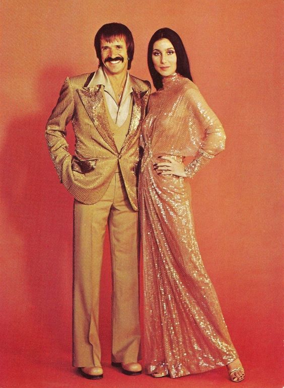 1970s Cher and Sonny - gold sequin dress, gold suit Sonny And Cher Outfits, Cher 1970s, Moda Disco, Sonny And Cher Show, Cher 70s, Cher Show, Sonny And Cher, Look Disco, Cher And Sonny