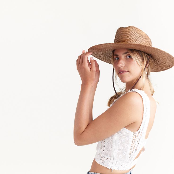 DESCRIPTION Born from earth and hand woven by artisans, the Del Sur collection is as natural as it gets. The Monterrey is a medium depth cattleman crown with an oversized brim treated with light stiffness for increased structure and shape. Made from our premium regular tripilla palm straw in Toast color, this hat has a UPF 50+ rating and offers excellent UV sun protection. Directly from the earth alongside our artisan partners, we bring you handmade quality you can trust. Multiple sizes availabl Everyday Natural Brimmed Boater Hat, Natural Boater Hat With Flat Brim For Everyday, Everyday Natural Boater Hat With Flat Brim, Artisan Straw Hat For Ranch In Summer, Bohemian Wide Brim Hat For Everyday, Everyday Bohemian Wide Brim Sun Hat, Rustic Sun Hat With Curved Brim For Spring, Bohemian Hat With Curved Brim For Everyday, Adjustable Flat Crown Boater Hat For Everyday