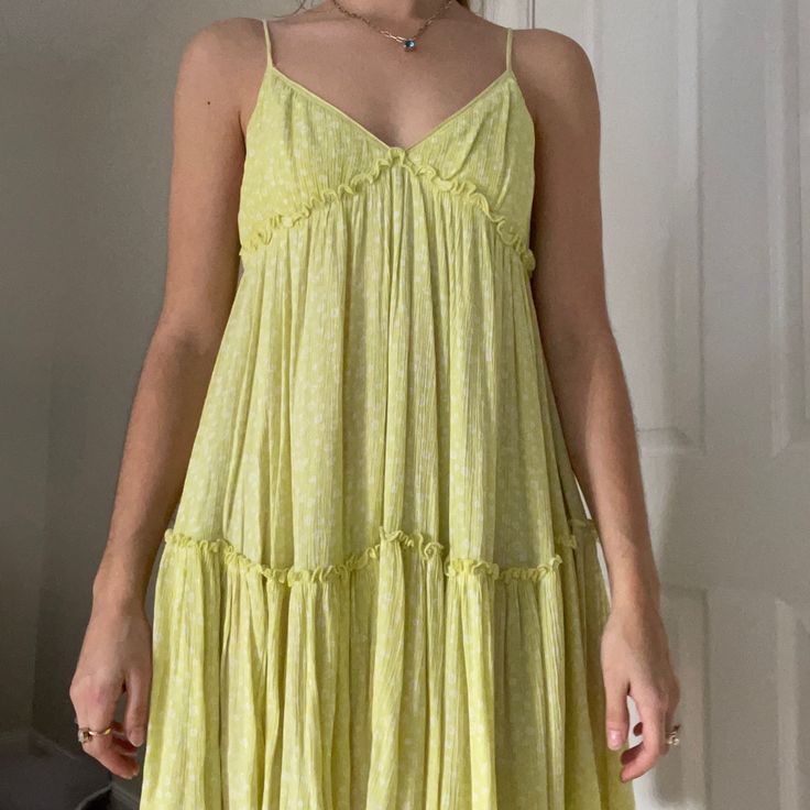 Lime Green/Yellow With White Polka Dots. Never Worn With No Tags. Perfect For Spring And Summer. Light Weight. Yellow Ruffled Sundress For Summer, Yellow Casual Sundress With Ruffles, Lemon Print Sundress For Spring, Casual Yellow Sundress With Ruffles, Spring Lemon Print Sundress, Casual Yellow Ruffled Sundress, Casual Lime Green Spring Dress, Casual Lime Green Sleeveless Dress, Flowy Yellow Sundress With Ruffles