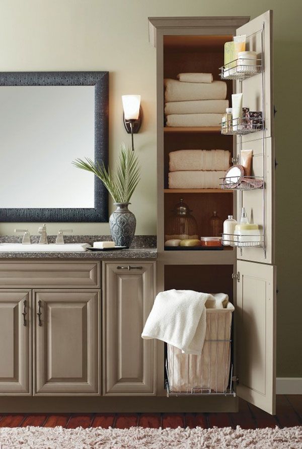 the bathroom is clean and ready to be used as a storage area for towels or other items