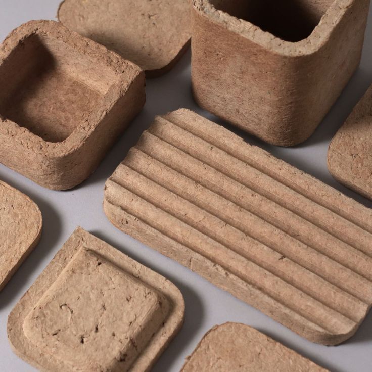 several pieces of clay sitting on top of a table