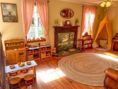 a living room filled with furniture and a fire place next to a wooden floor covered in rugs