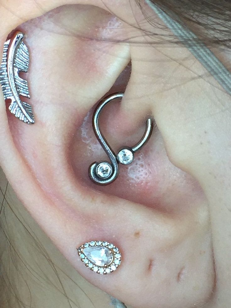 This beautiful 16g Niobium Daith piece has been handcrafted and high polished for an incredibly smooth and bright finish. It features two bright cubic zirconia gems and is set up similar to captive bead ring. If you need help with sizing, please see my shop FAQ section or message me. If you would like a matching pair, please order them in pairs to assure they match perfectly. Niobium is a non-tarnishing, hypoallergenic soft metal. Each piece from Voodoo Metals is meticulously handmade and High-p Unique Silver Adjustable Body Jewelry, Unique Nickel Free Cartilage Earrings, Unique Nickel-free Round Cartilage Earrings, Unique Sterling Silver Body Jewelry For Gifts, Unique Sterling Silver Body Jewelry Gift, Unique Sterling Silver Body Jewelry In Silver, Unique Hypoallergenic Hoop Jewelry, Unique Sterling Silver Internally Threaded Jewelry, Unique Silver Septum Ring